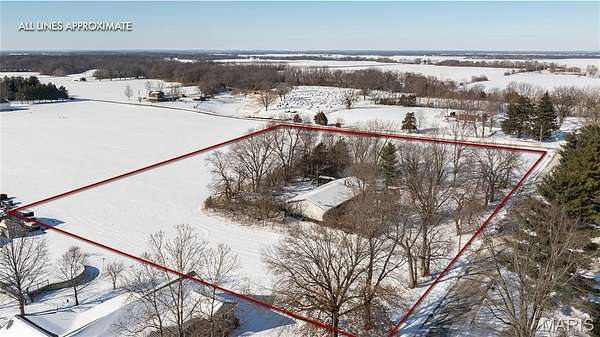 4.75 Acres of Residential Land with Home for Auction in Medora, Illinois