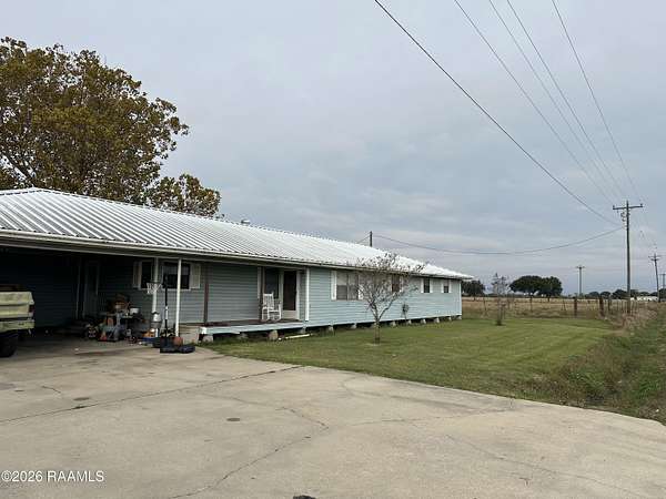 1.7 Acres of Residential Land with Home for Sale in Crowley, Louisiana