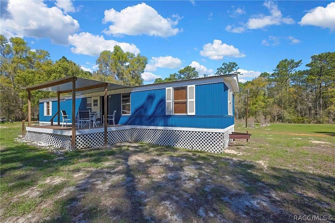 2.54 Acres of Land with Home for Sale in Dunnellon, Florida