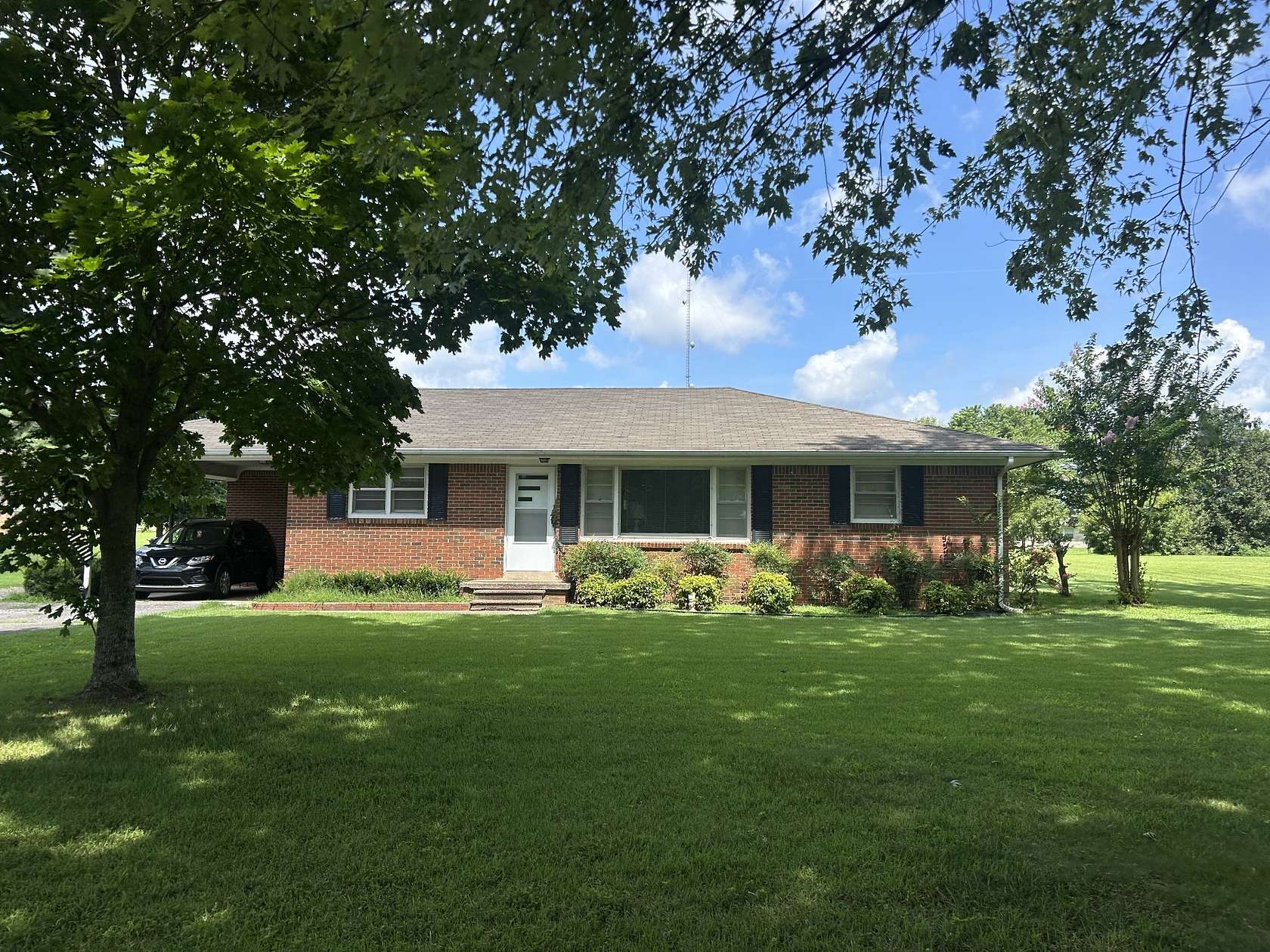 1.69 Acres of Residential Land with Home for Sale in Leoma, Tennessee