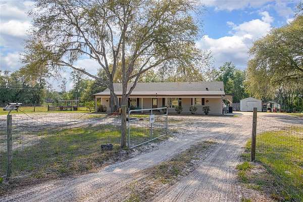 2.54 Acres of Residential Land with Home for Sale in De Leon Springs, Florida