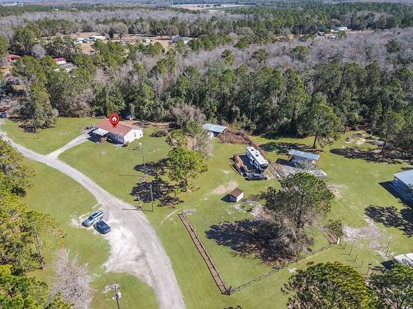 3 Acres of Residential Land with Home for Sale in Polk City, Florida