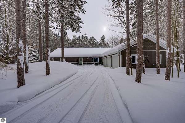 5.3 Acres of Residential Land with Home for Sale in Lake Ann, Michigan