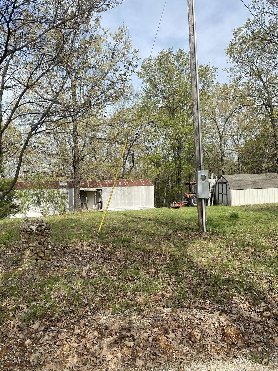 45 Acres of Recreational Land with Home for Sale in Gainesville, Missouri