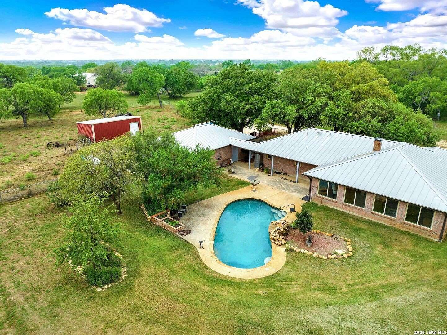 16.3 Acres of Land with Home for Sale in St. Hedwig, Texas