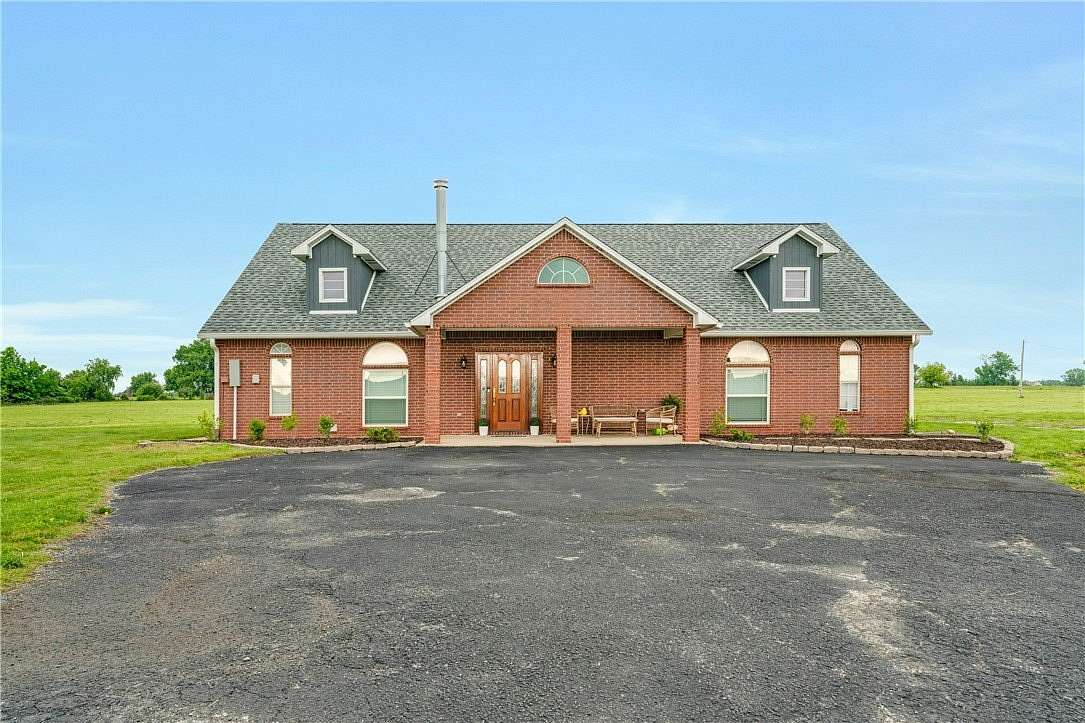 9 Acres of Land with Home for Sale in Siloam Springs, Arkansas