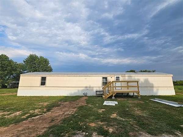 4.67 Acres of Residential Land with Home for Sale in Tahlequah, Oklahoma