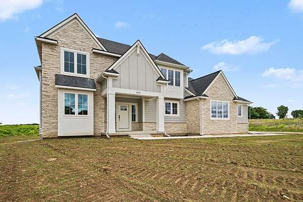 2.3 Acres of Land with Home for Sale in Caledonia, Michigan