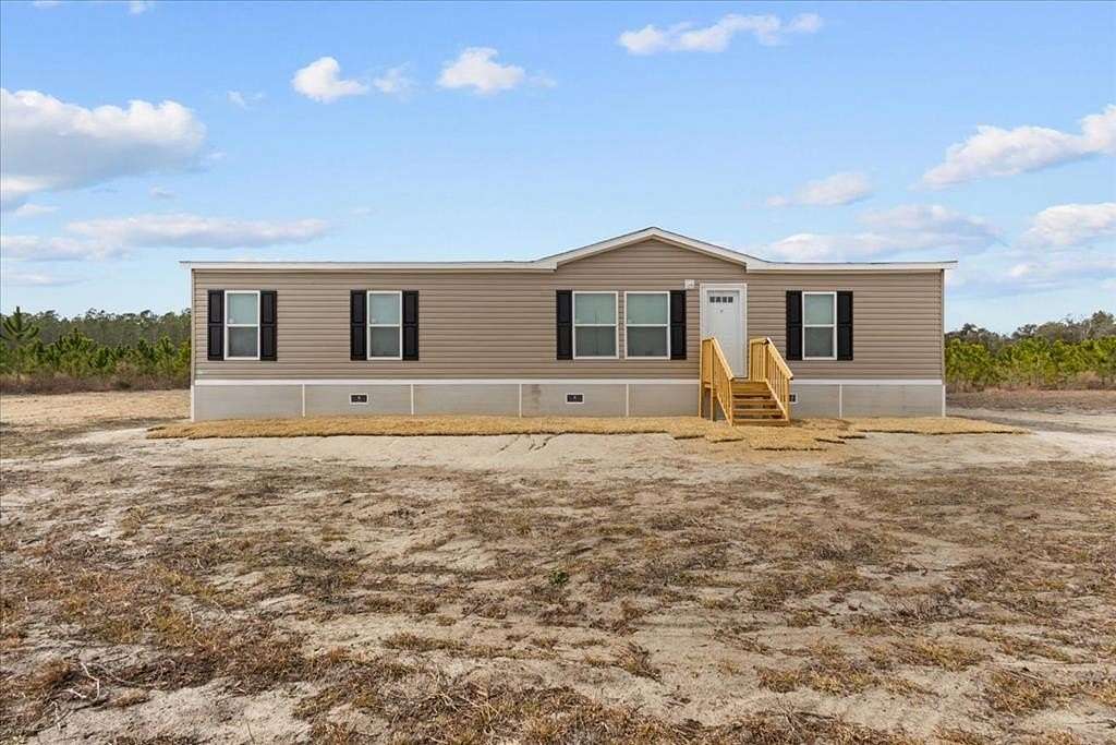 4.74 Acres of Land with Home for Sale in Bell, Florida
