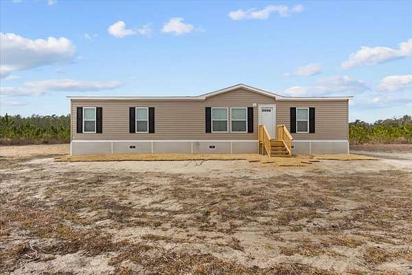 4.74 Acres of Land with Home for Sale in Bell, Florida
