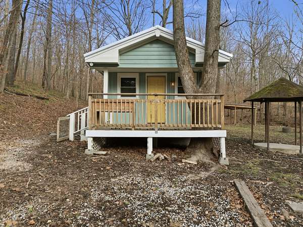 5 Acres of Residential Land with Home for Sale in Santa Fe, Tennessee