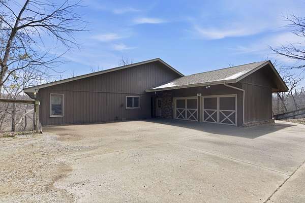 47.9 Acres of Recreational Land with Home for Sale in Buffalo, Missouri