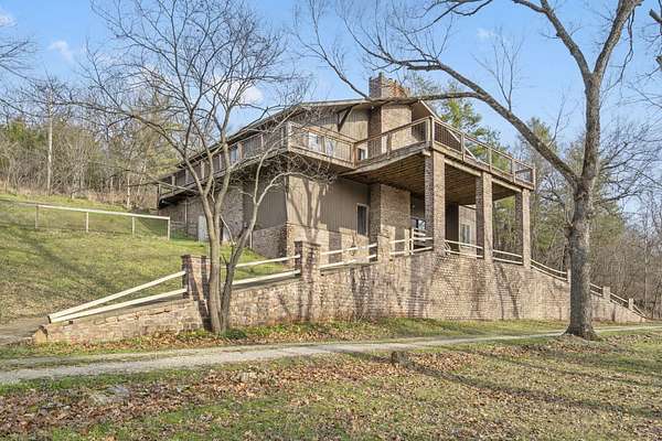 47.9 Acres of Recreational Land with Home for Sale in Buffalo, Missouri