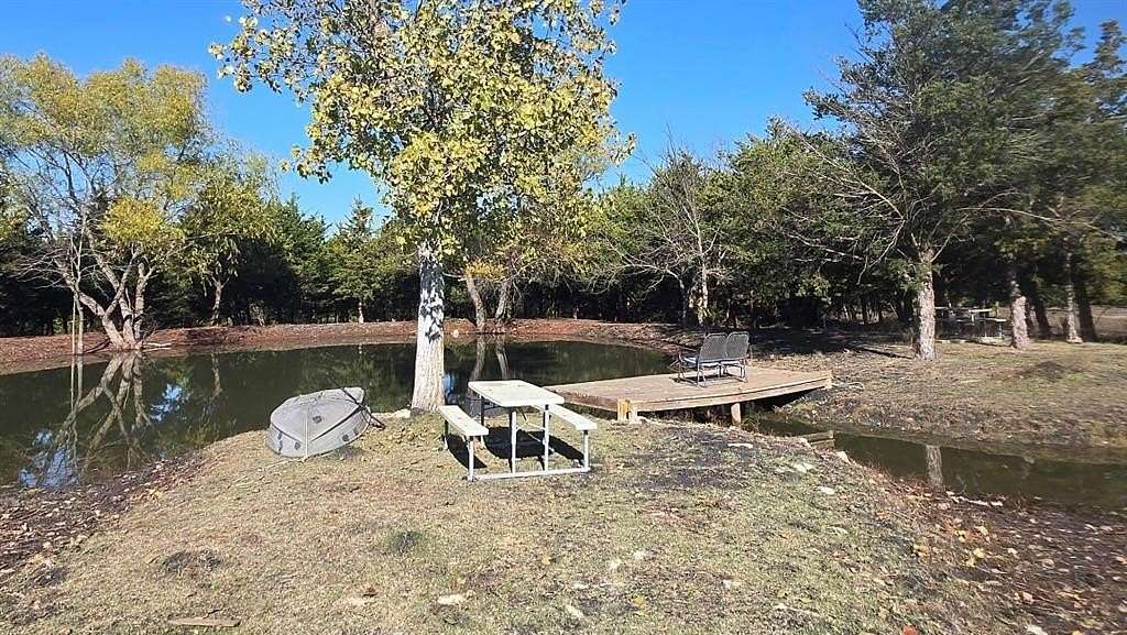 28.3 Acres of Land with Home for Sale in Wolfe City, Texas