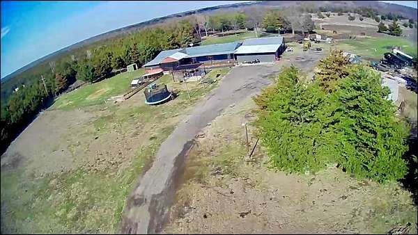 10 Acres of Recreational Land with Home for Sale in Wolfe City, Texas