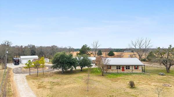 10 Acres of Land with Home for Sale in Quinlan, Texas