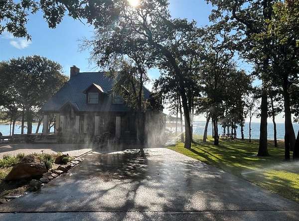 1.67 Acres of Residential Land with Home for Sale in Lakewood Village, Texas