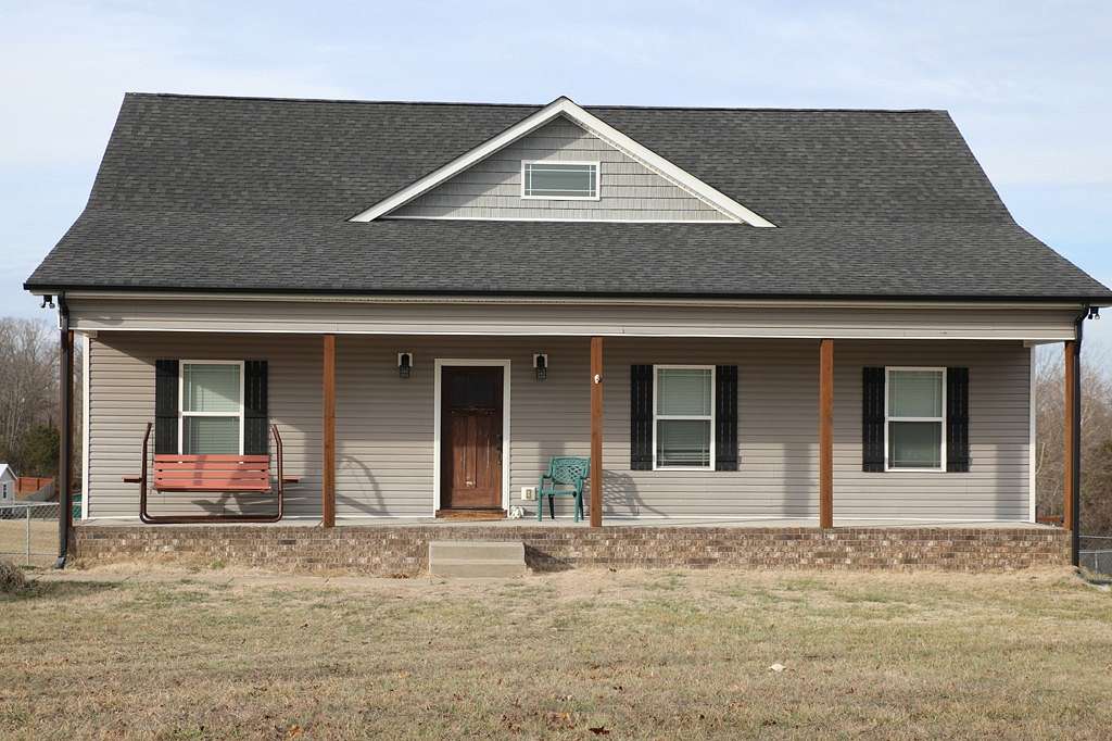 1.56 Acres of Residential Land with Home for Sale in Charlotte, Tennessee