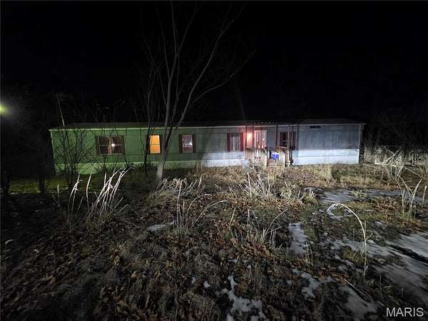 4.25 Acres of Residential Land with Home for Sale in Plattin Township, Missouri