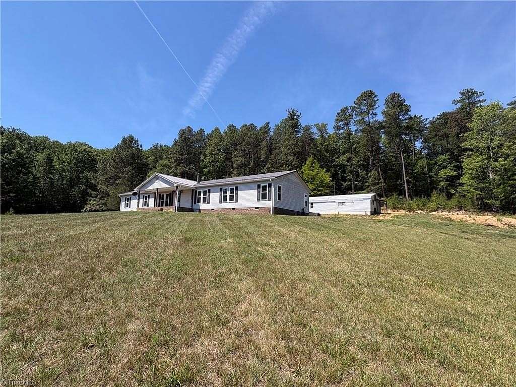 2.73 Acres of Land with Home for Sale in Walkertown, North Carolina