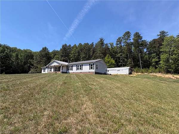 2.73 Acres of Land with Home for Sale in Walkertown, North Carolina