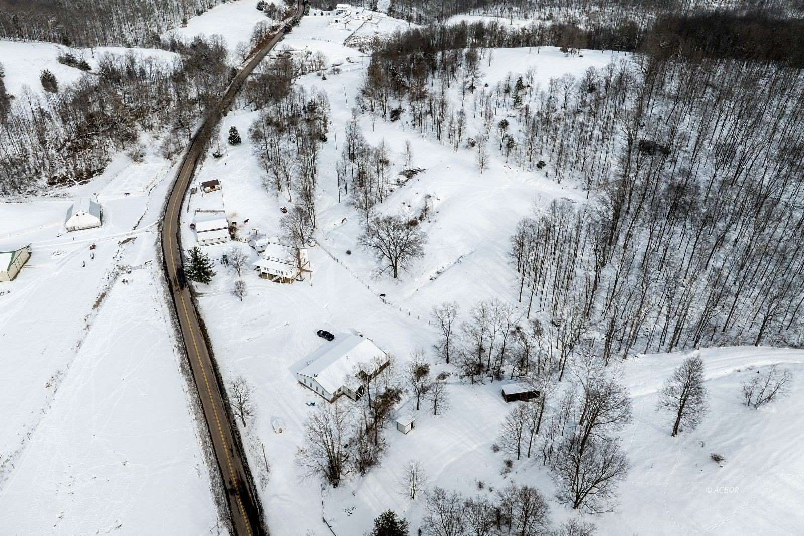 14.1 Acres of Land with Home for Sale in Patriot, Ohio