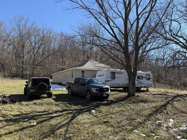 8.7 Acres of Residential Land with Home for Sale in Mansfield, Missouri