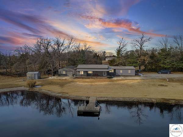 31.5 Acres of Recreational Land with Home for Sale in Clinton, Missouri