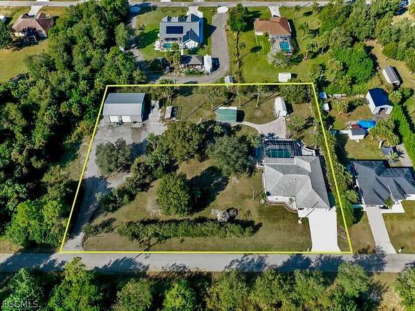 1.5 Acres of Land with Home for Sale in Lehigh Acres, Florida