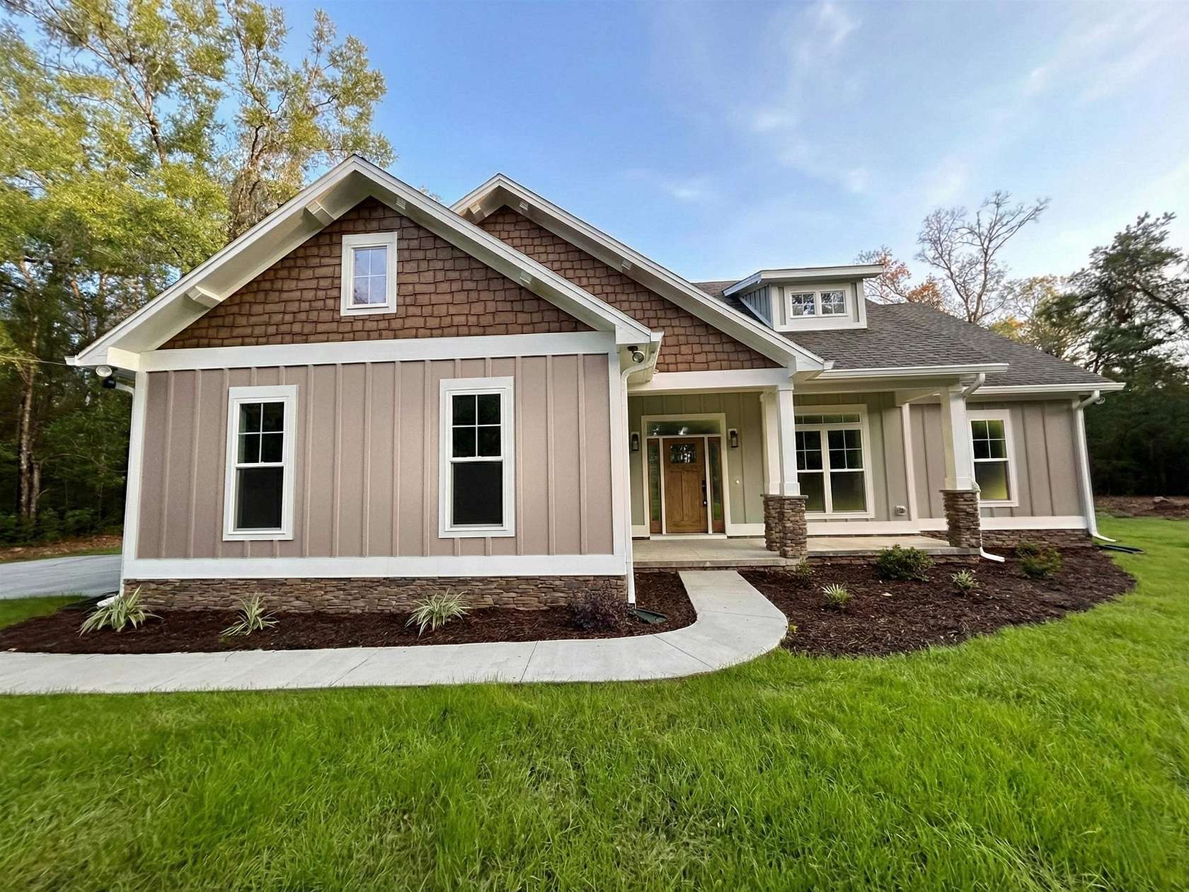 5.35 Acres of Residential Land with Home for Sale in Crawfordville, Florida