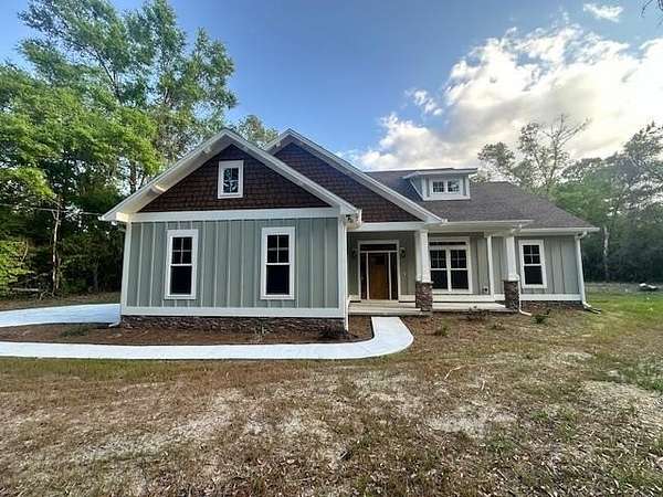 5.35 Acres of Land with Home for Sale in Crawfordville, Florida