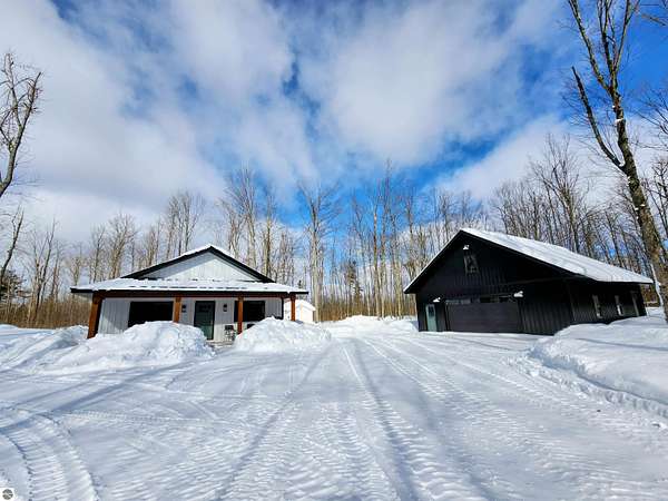 2 Acres of Residential Land with Home for Sale in Elmira, Michigan