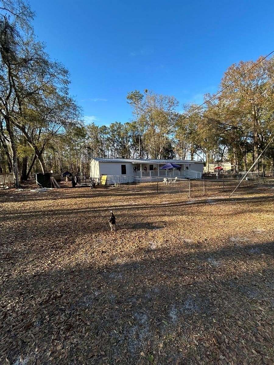 2 Acres of Residential Land with Home for Sale in Gainesville, Florida