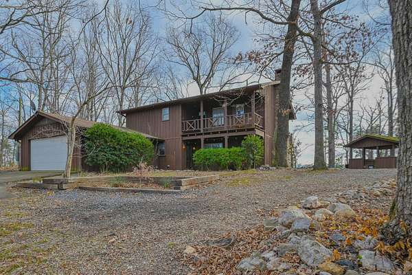 73 Acres of Recreational Land with Home for Sale in Mena, Arkansas