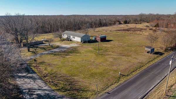 1.74 Acres of Residential Land with Home for Sale in Marionville, Missouri