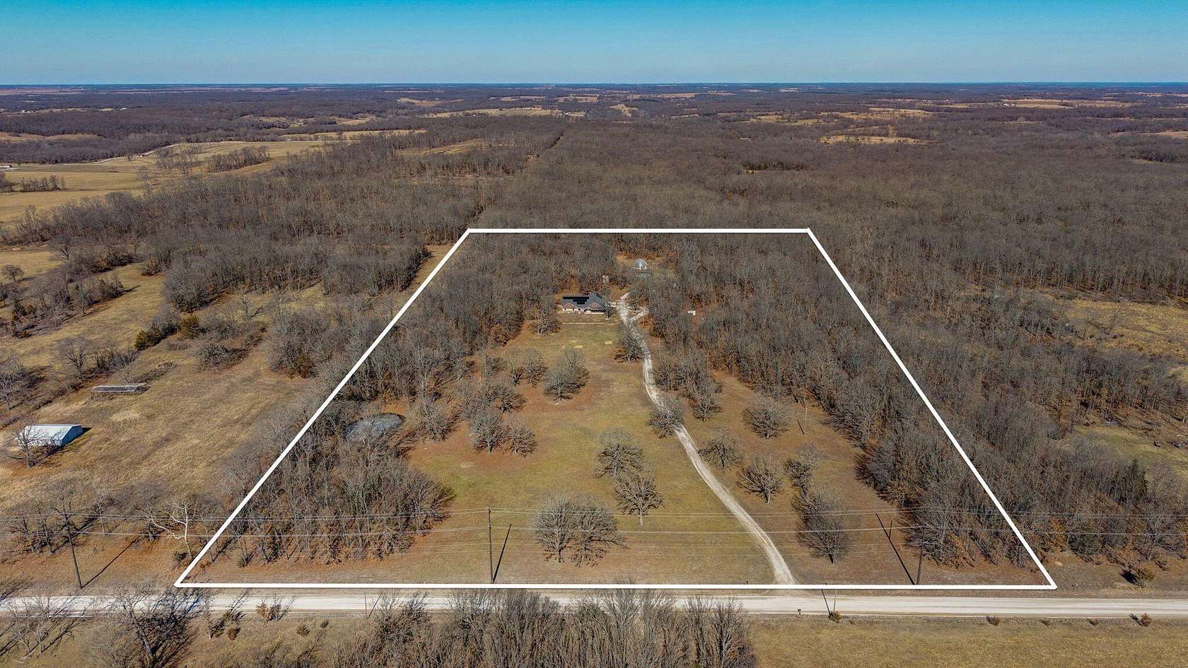19.7 Acres of Land with Home for Sale in Greenfield, Missouri