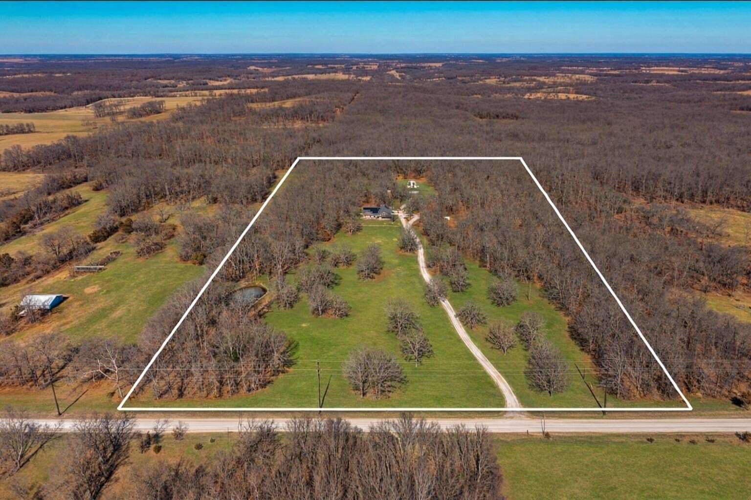 19.7 Acres of Land with Home for Sale in Greenfield, Missouri