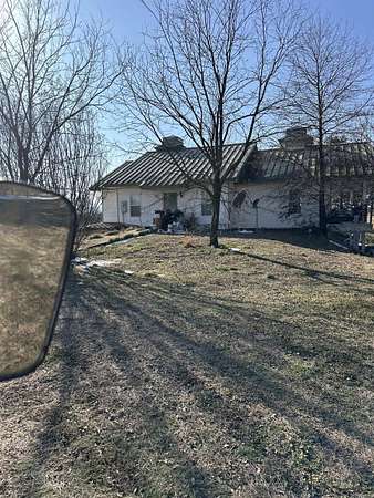 2.1 Acres of Residential Land with Home for Sale in Belleville, Arkansas