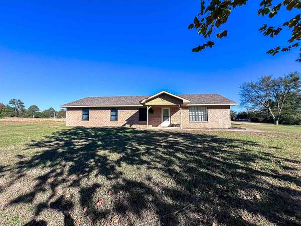 8 Acres of Residential Land with Home for Sale in Mount Pleasant, Texas