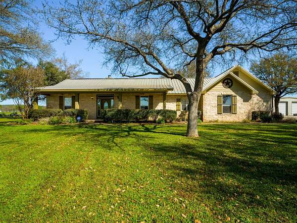 9.49 Acres of Land with Home for Sale in Marble Falls, Texas