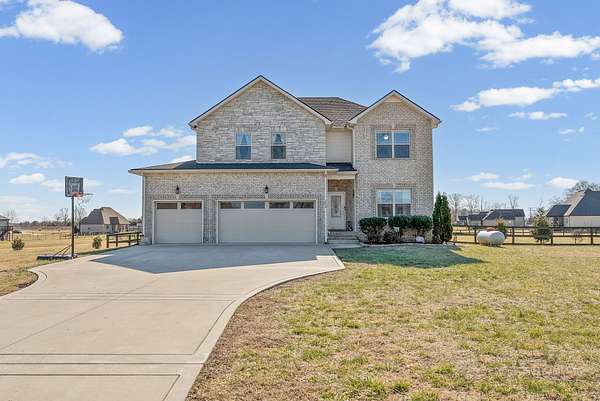 1.5 Acres of Residential Land with Home for Sale in Woodlawn, Tennessee