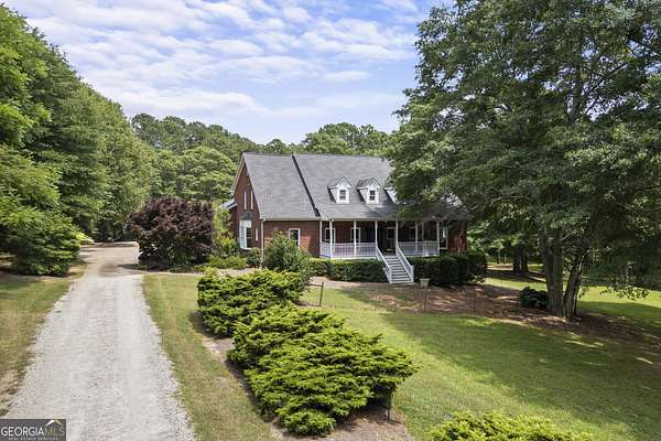 6.27 Acres of Land with Home for Sale in Loganville, Georgia