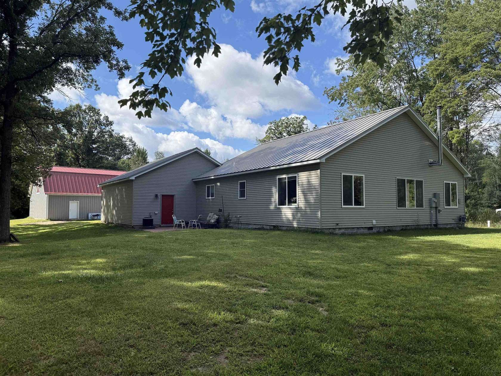 47 Acres of Recreational Land with Home for Sale in Beaverton, Michigan