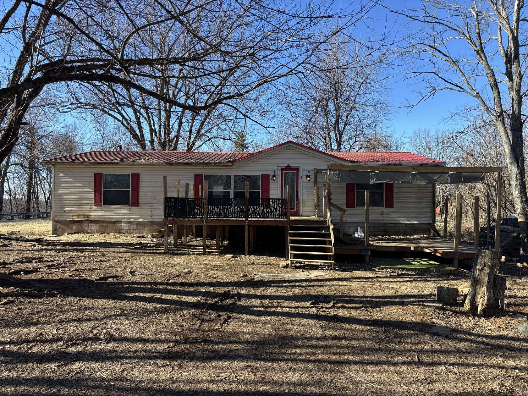 4.7 Acres of Residential Land with Home for Sale in Bradyville, Tennessee