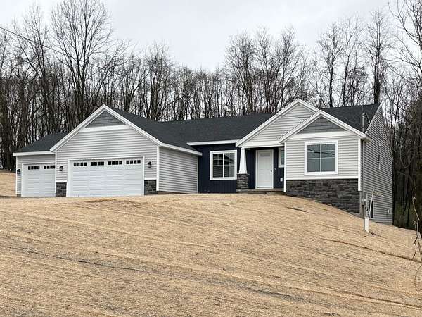 1.5 Acres of Land with Home for Sale in Rockford, Michigan