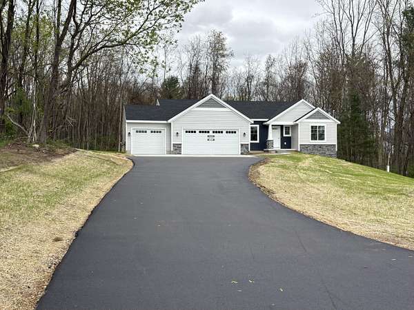 1.5 Acres of Land with Home for Sale in Rockford, Michigan