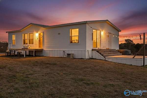 5.1 Acres of Residential Land with Home for Sale in Crossville, Alabama