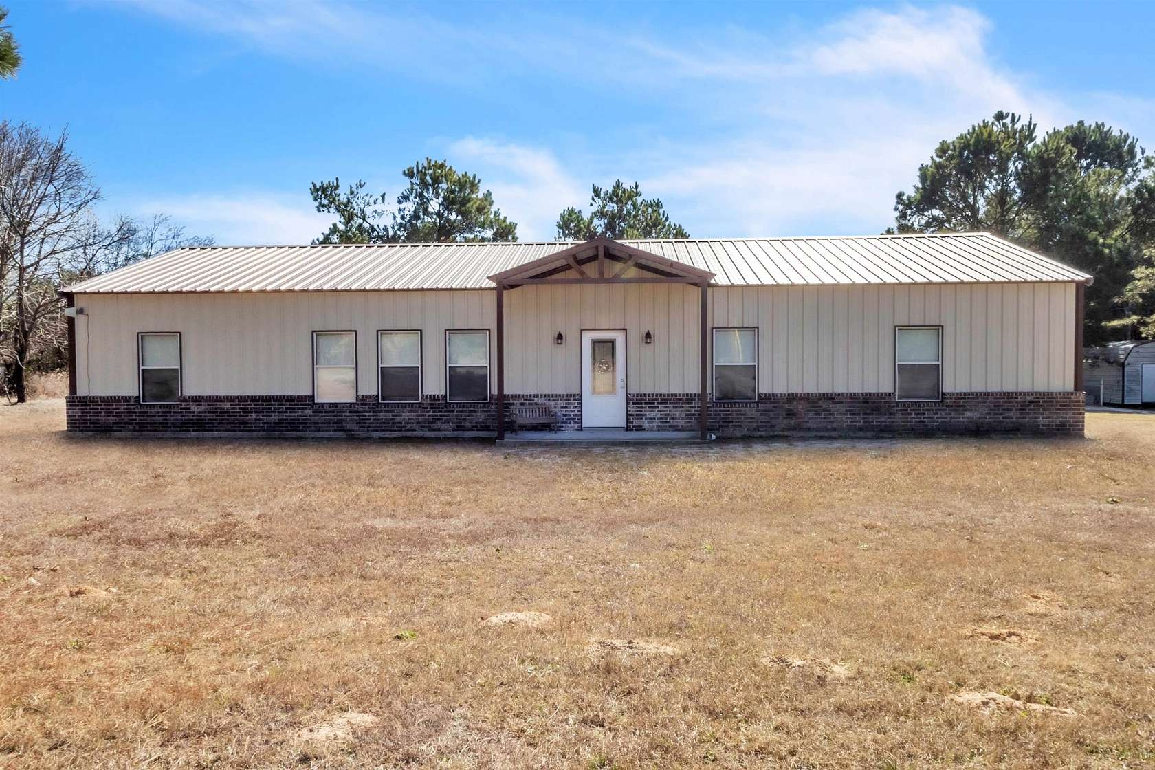 1.5 Acres of Land with Home for Sale in Gilmer, Texas