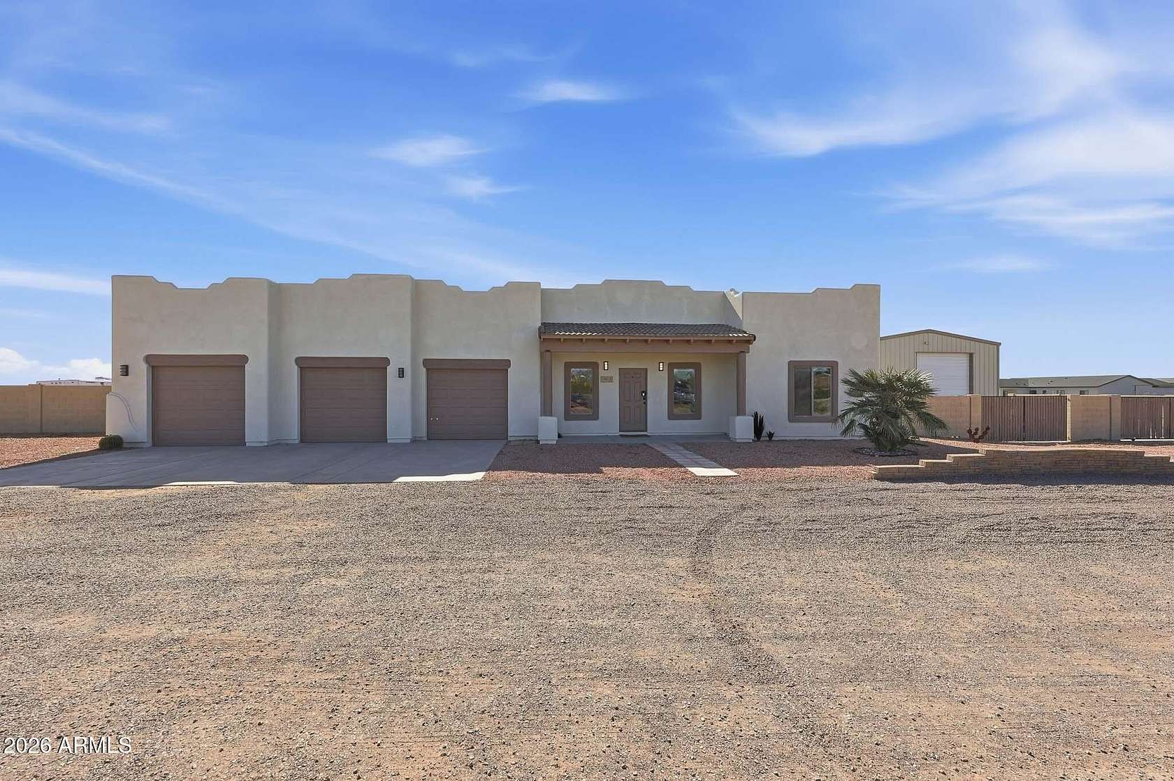2 Acres of Residential Land with Home for Sale in Wittmann, Arizona