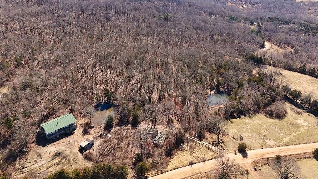 16.7 Acres of Land with Home for Sale in Witter, Arkansas